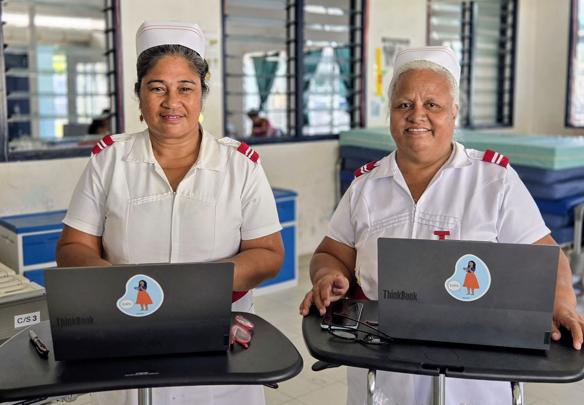 From left; Makite Neemia and Keeang Kararaiti, Sisters at the Tungaru Central Hospital in Kiribati using the new Maternal Health Care Program Registry in the Tamanu EMR.